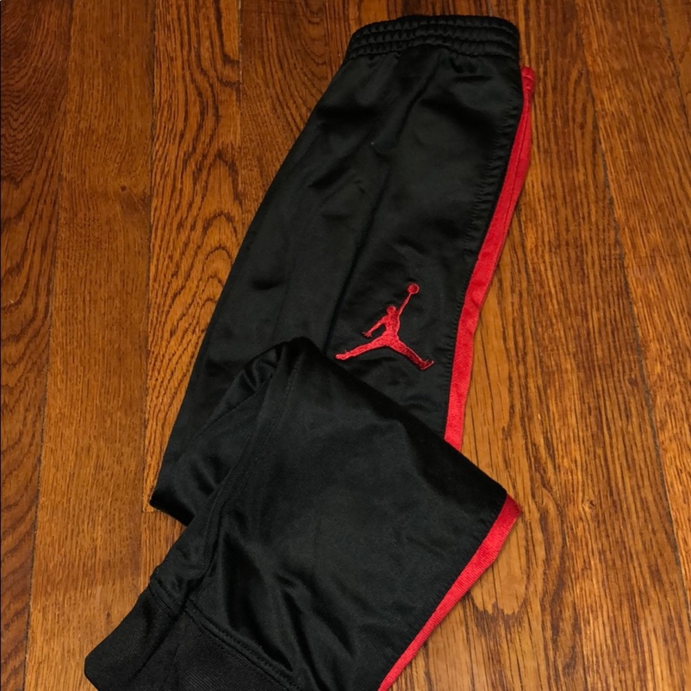 Red and black Jordan joggers boys size 7-used